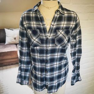 Blue plaid long sleeve, button down, shirt.